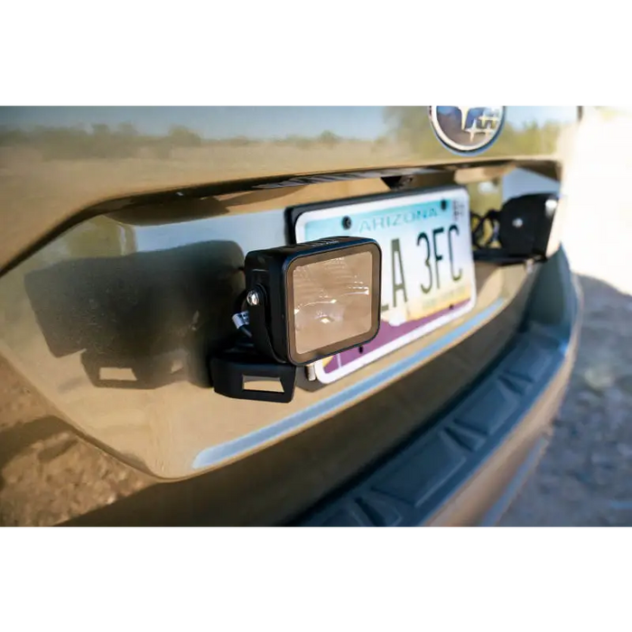 DV8 Offroad Universal License Plate Mount with Pod Light Mounts in car