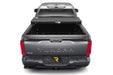 Gray 2019 rambo truck rear view displayed in extang solid fold alx for toyota tacoma bed