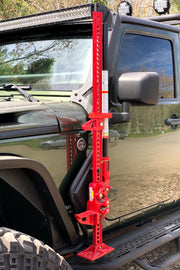 Red hitch bar on jeep wrangler jk/jku exterior jack mount
