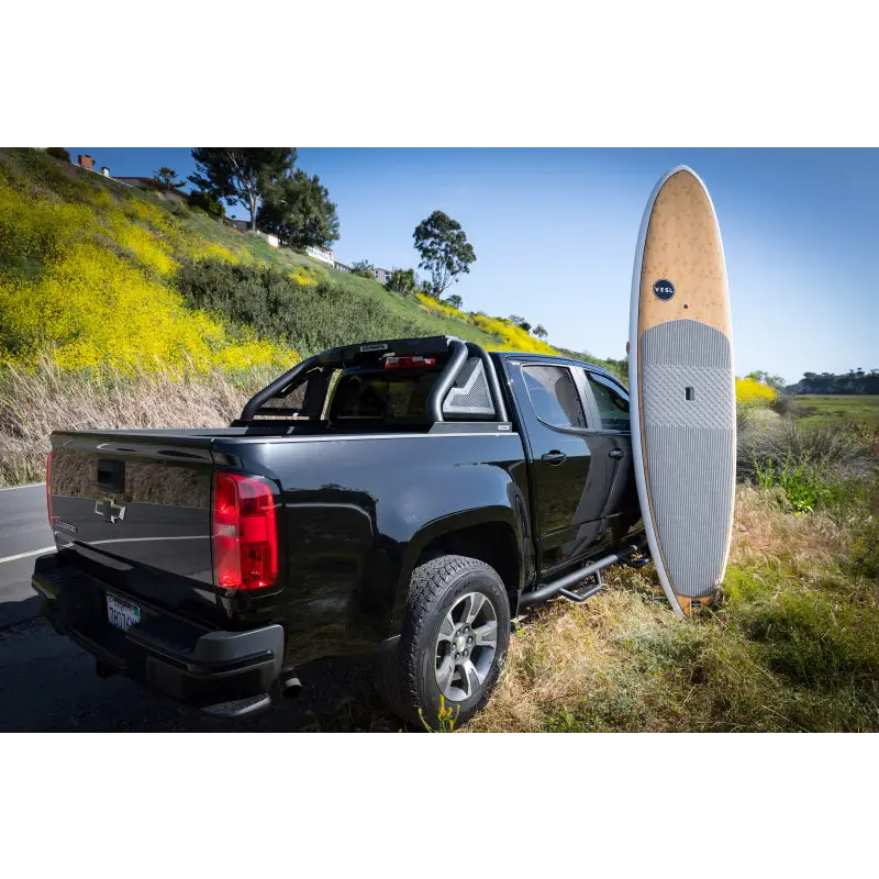 Chevrolet Colorado Sport Bar 2.0 with surfboard on truck