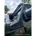 Close up of Jeep Wrangler windshield light bar mount with truck & light bar.