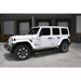 A white jeep with black wheels and a black bumper