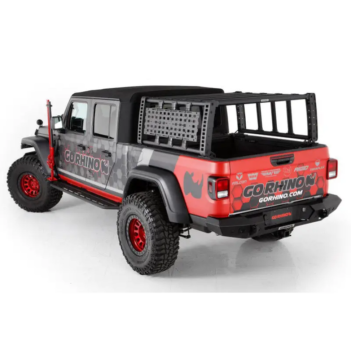 Red Jeep with black and white graphics, Go Rhino 19-21 Jeep Gladiator XRS Overland Xtreme Rack - Black