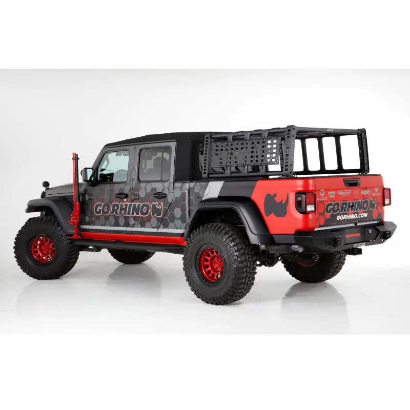 Red Jeep with black and white decal on Go Rhino Jeep Gladiator XRS Overland Xtreme Rack.
