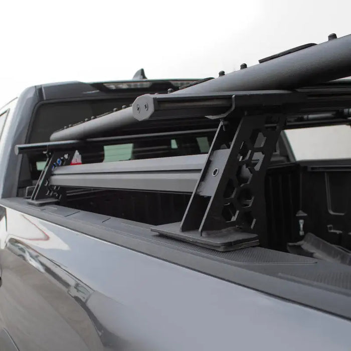 Roof rack mounted on truck cross bars.