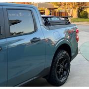 Blue truck in driveway - Go Rhino XRS Cross Bars Kit - Tex. Blk