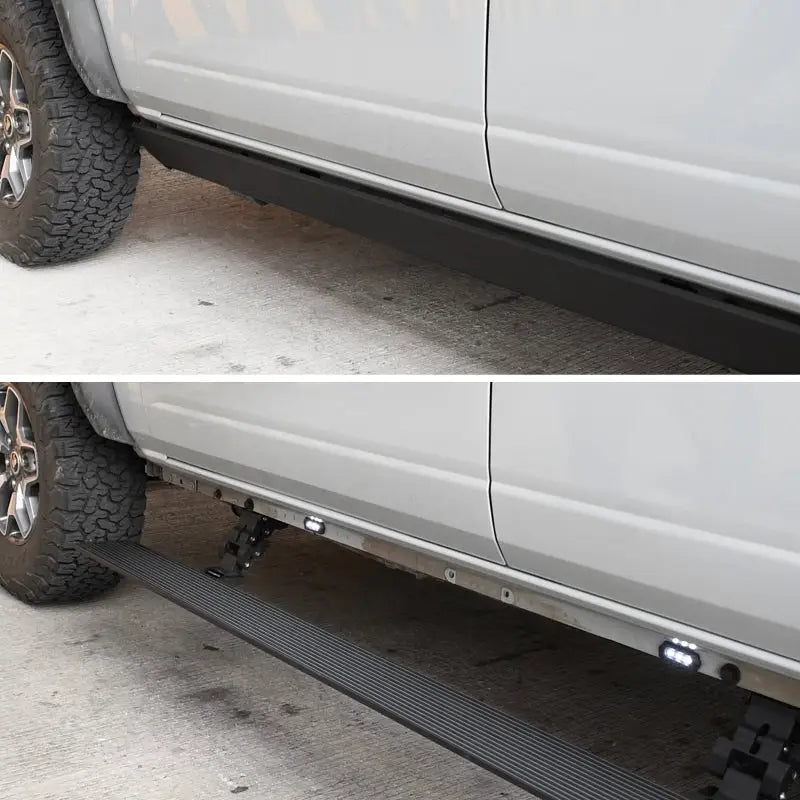 Go Rhino electric running board kit with black tire tread on a white truck