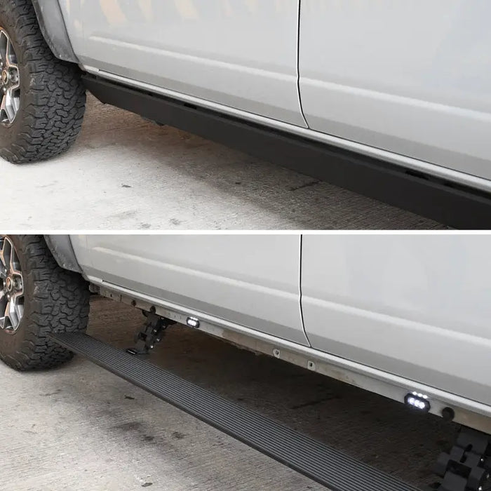 Go Rhino electric running board with a black tire tread on white truck