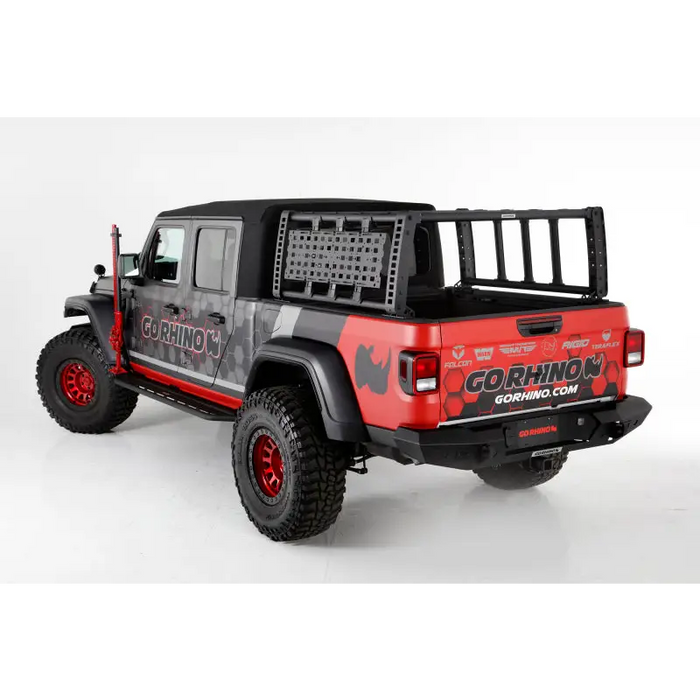 Go Rhino Rhino Accessory Gear Plate Kit with red Jeep, black bumper, and red wheels