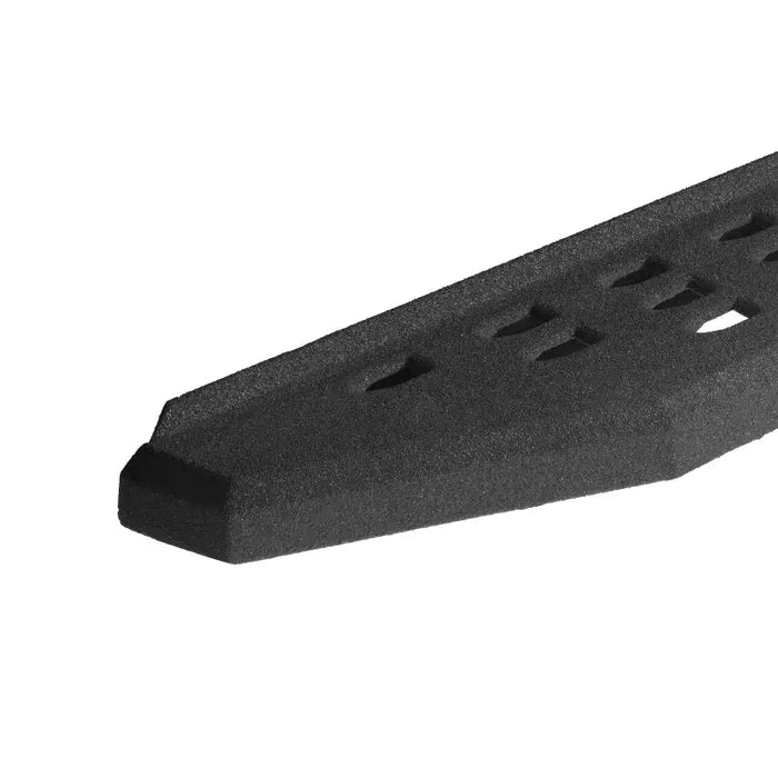 Black plastic block with holes displayed in Go Rhino RB20 Running Boards - Bedliner - 87in.