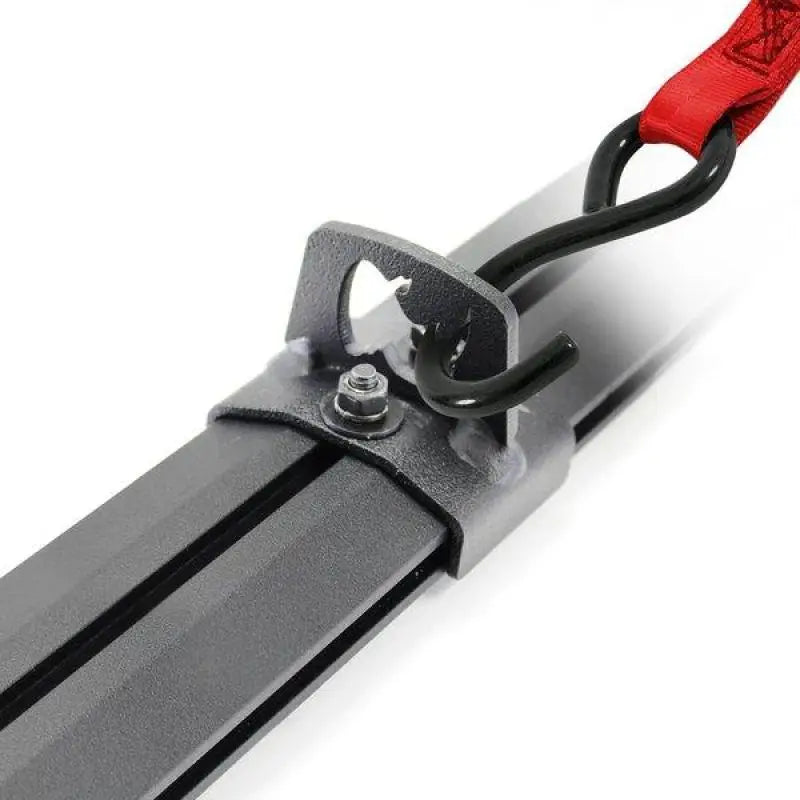 Black and red Rhino Tie Down Kit strap with red hook for Jeep Wrangler.