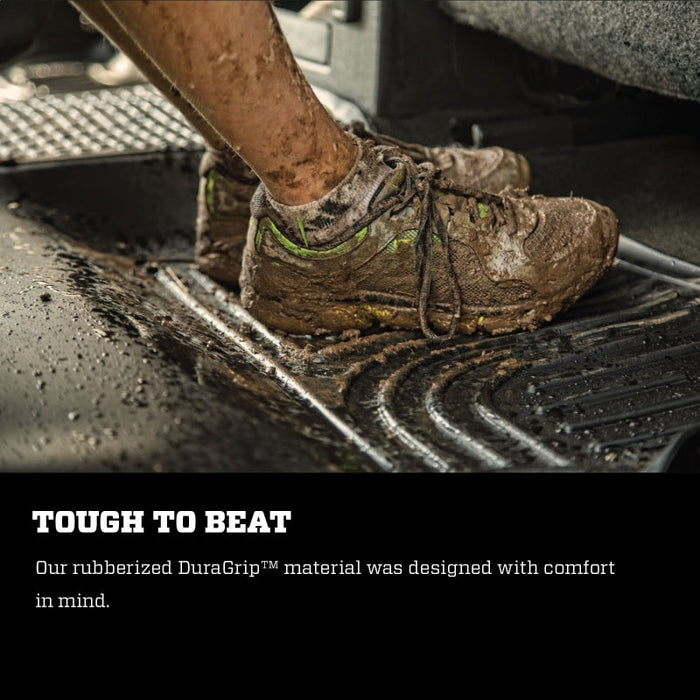 Person putting mud into a pot on husky liners floor liner