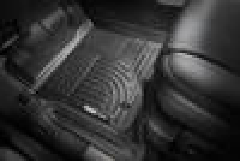 Black and white photo of husky liners 14 jeep wrangler front floor liners