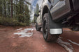 Black rubber mud flaps on dirt road for chevrolet silverado