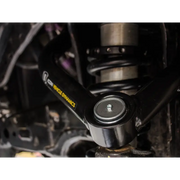 ICON Delta Joint Kit for Toyota Tacoma, Tundra, Nissan Titan XD, GM 1500 - Bottom view of motorcycle with black and yellow logo