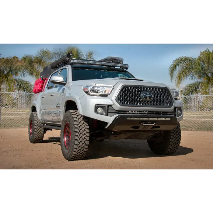 ICON 2016+ Toyota Tacoma Front Impact Bumper with Light Bar on Arafed Truck