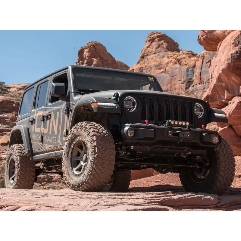 ICON 2018+ Jeep Wrangler JL 2.5in Stage 1 Suspension System on rocky road.