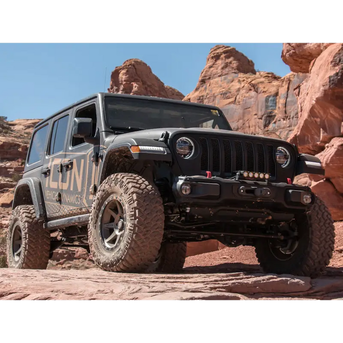 ICON 2018+ Jeep Wrangler JL 2.5in Stage 1 Suspension System on rocky road.