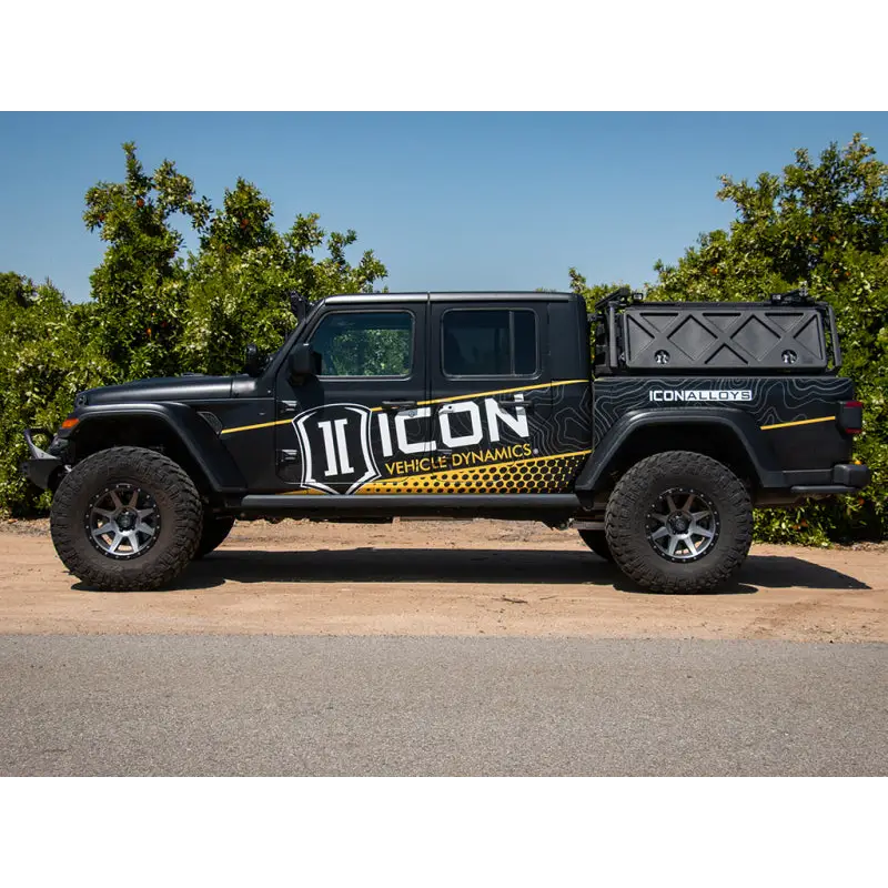 Black Jeep Gladiator JT with yellow and black decal - ICON 2.5in Suspension System