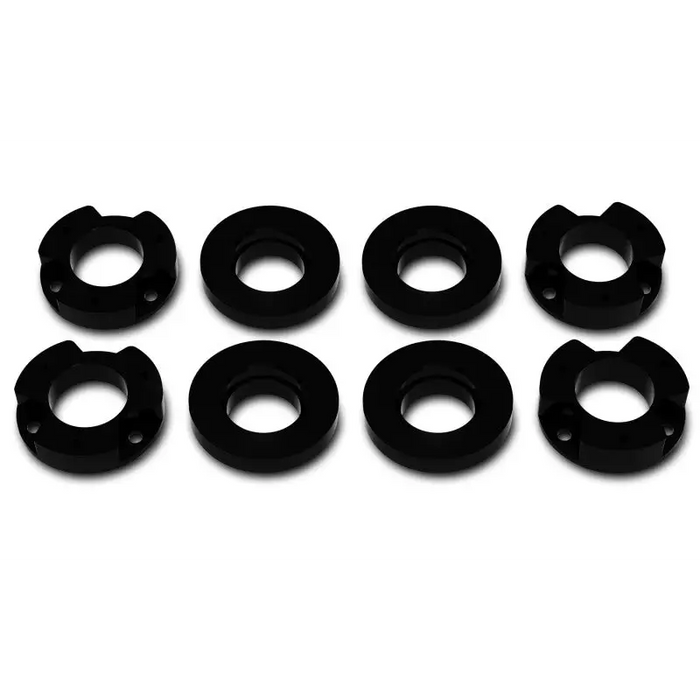 Black silicon ear tunnels displayed in ICON 2021+ Ford Bronco 3in Lift C/O Spacer Kit.