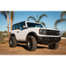 White Ford Bronco with a large tire, ICON 3in Lift Coilover Spacer Kit