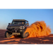 Black truck driving through desert, ICON 2021+ Ford Bronco tie rod kit.