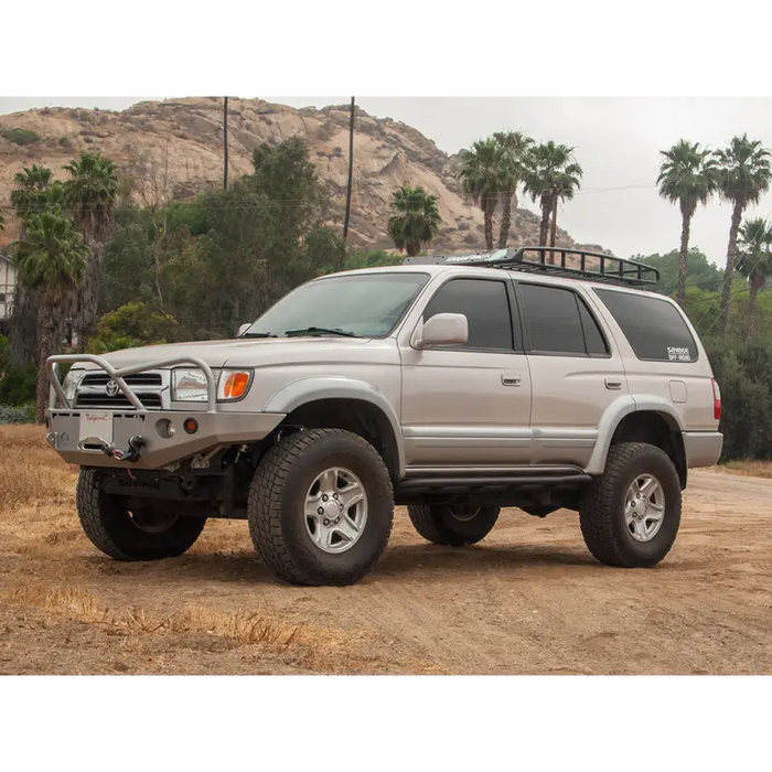 Silver toyota 4runner suv parked on dirt road