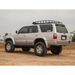 Silver suv parked on dirt road showcasing icon 96-02 toyota 4runner 0-3in stage 3 suspension system.