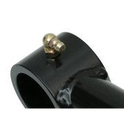 Black plastic tube with brass fitting on upper control arm Delta Joint kit.