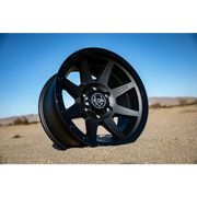 ICON Rebound 17x8.5 Wheel in Double Black color on desert landscape