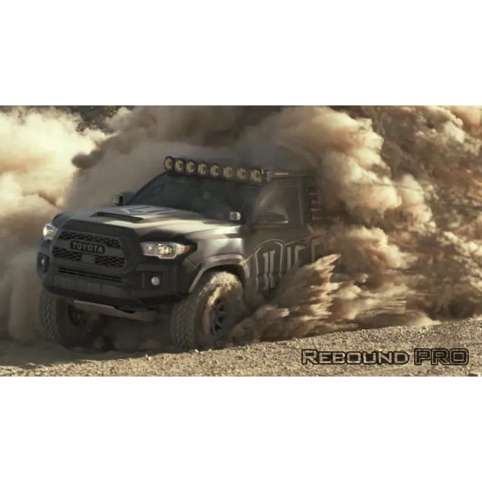 Toyota F-series truck driving through desert, ICON Rebound Pro 17x8 wheel.