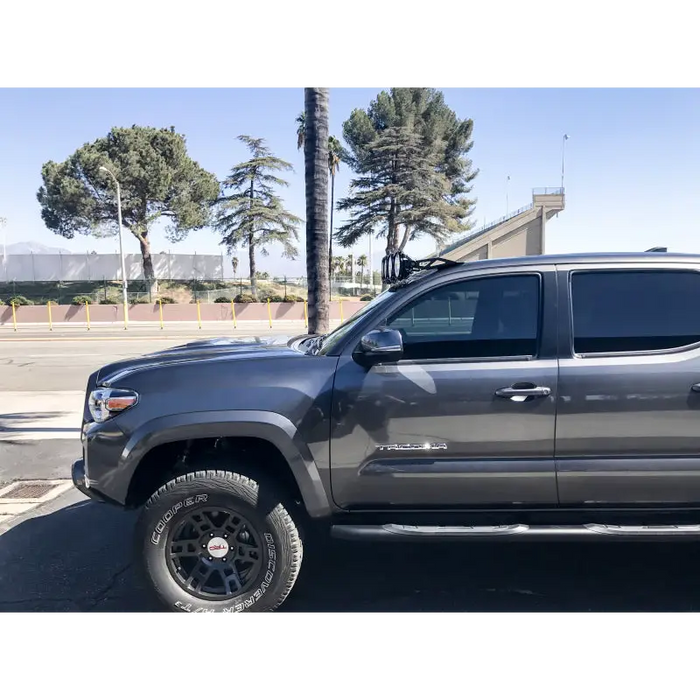 Gray truck parked in lot, Toyota Tacoma 50in Pro6 Gravity LED Overhead Light Bar Sys.