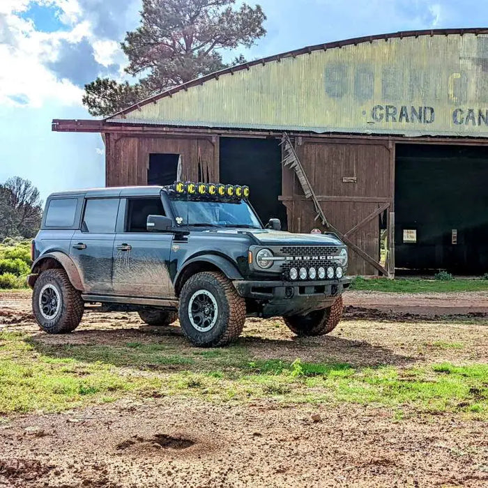 Black Jeep parked in front of barn - KC HiLiTES 21+ Ford Bronco 39in Gravity LED Pro6 Light Kit