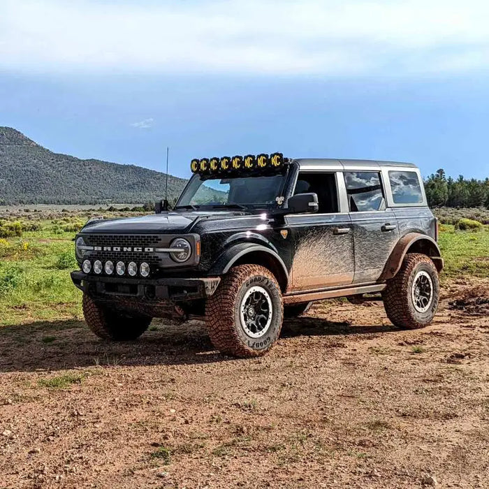 Offroad Ford Bronco 39in Gravity LED Pro6 Light Bar Kit on Jeep with lights on parked in field