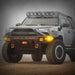 Grey Toyota truck with lights on, clear plastic light cover for KC HiLiTES Gravity Pro6 LED Lights.