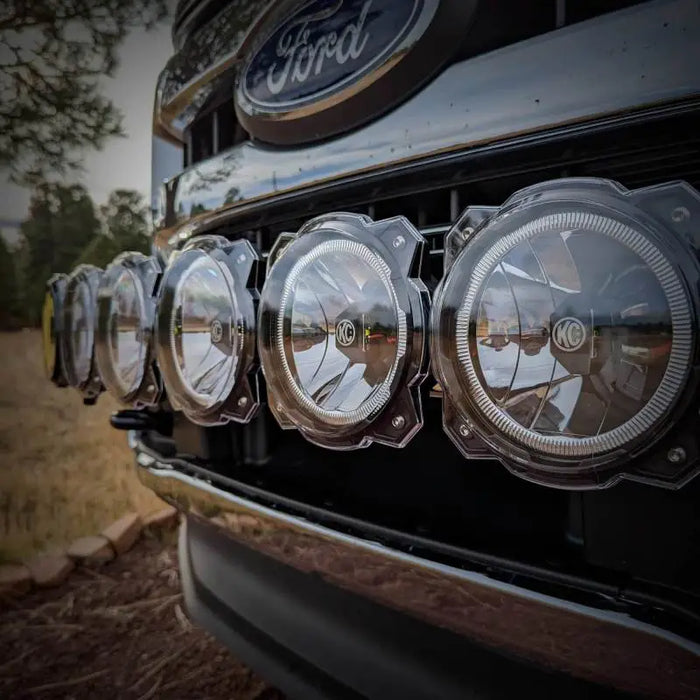 Black Ford truck with four lights using KC HiLiTES 6in. Light Shield for Gravity Pro6 LED Lights (Single) - Clear