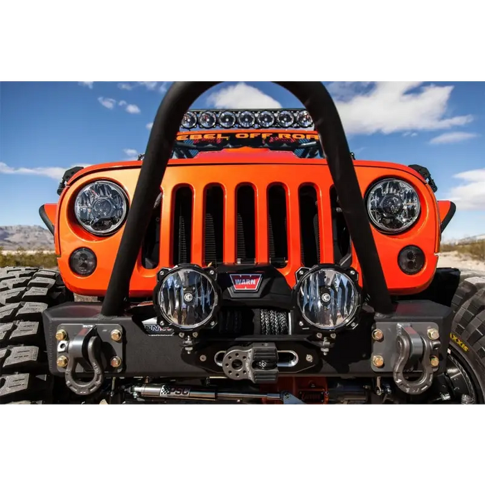 Close up of bright orange jeep front bumper with KC HiLiTES Pro6 Single Gravity LED Light ball mount.