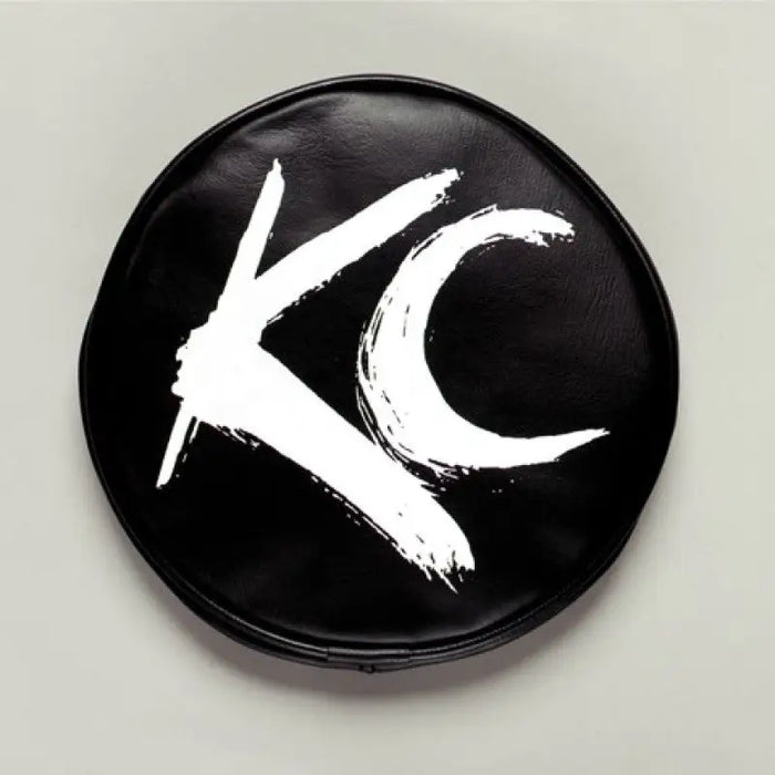 Black and white soft vinyl round light cover with letter K design