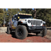 Jeep with light bar covered by KC HiLiTES 6in. Round Soft Covers in Black w/Yellow Logo