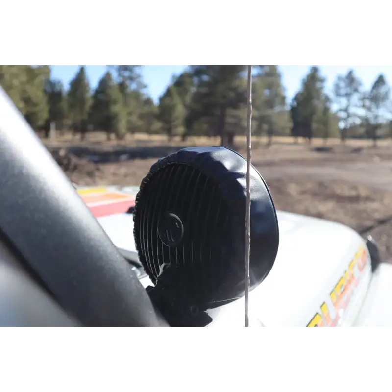 Black soft vinyl light covers for car air vents.