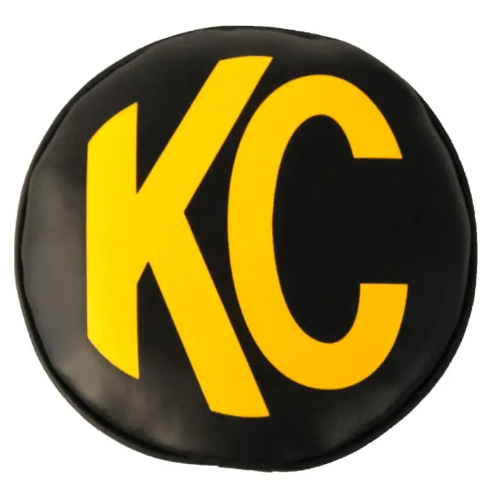 Round soft vinyl light covers with black and yellow KC logo