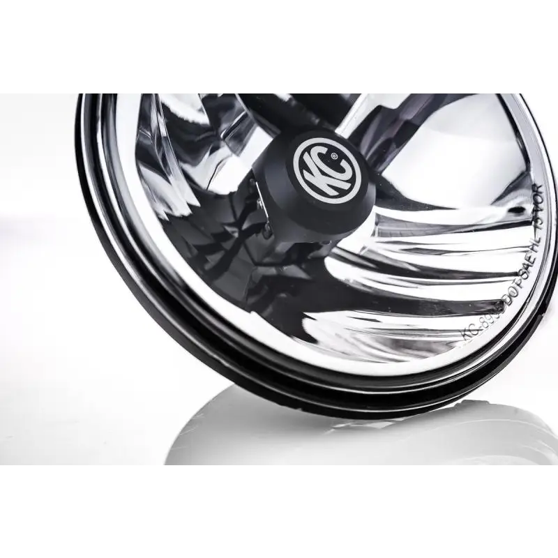 Black wheel with chrome spokes on KC HiLiTES 7in. Gravity LED H4 DOT Approved Replac. Headlight