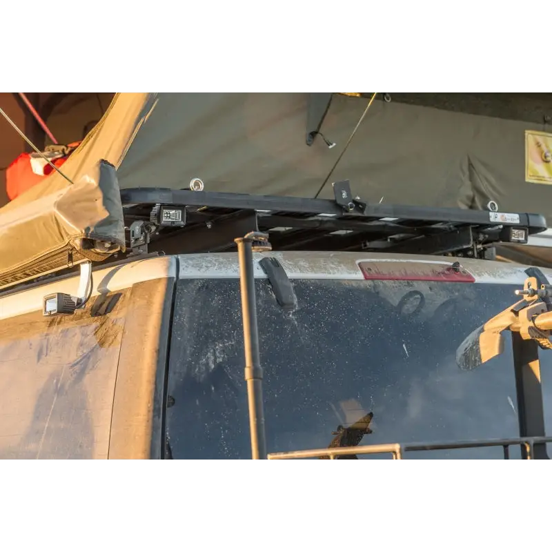 KC HiLiTES C-Series C2 LED 2in. Backup Area Flood Light attached to vehicle roof rack