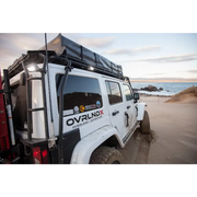 KC HiLiTES C-Series C2 LED Backup Area Flood Light mounted on Jeep roof rack