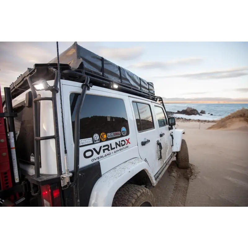 KC HiLiTES C-Series C2 LED Backup Area Flood Light mounted on Jeep roof rack