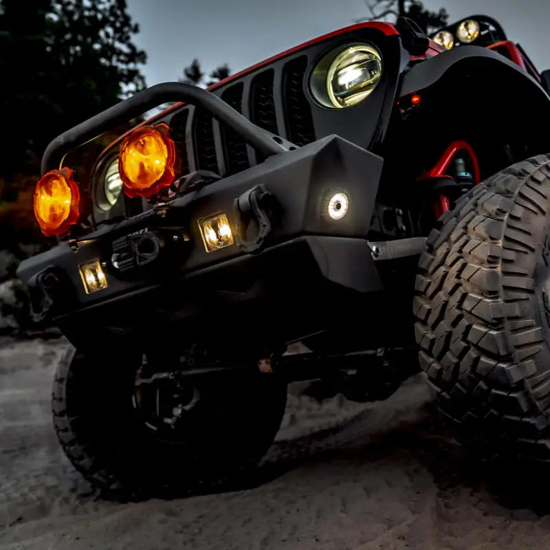 KC HiLiTES Cyclone V2 LED Accessory Light - 5w Flood Beam, Front end of a black jeep with light