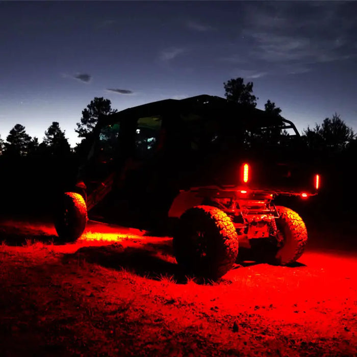 Red LED replacement lens for KC HiLiTES Cyclone V2 - 6-PK is displayed on a jeep with red lights.