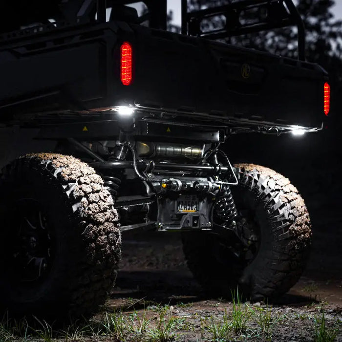 KC HiLiTES Cyclone V2 LED rock light on black jeep wrangler.