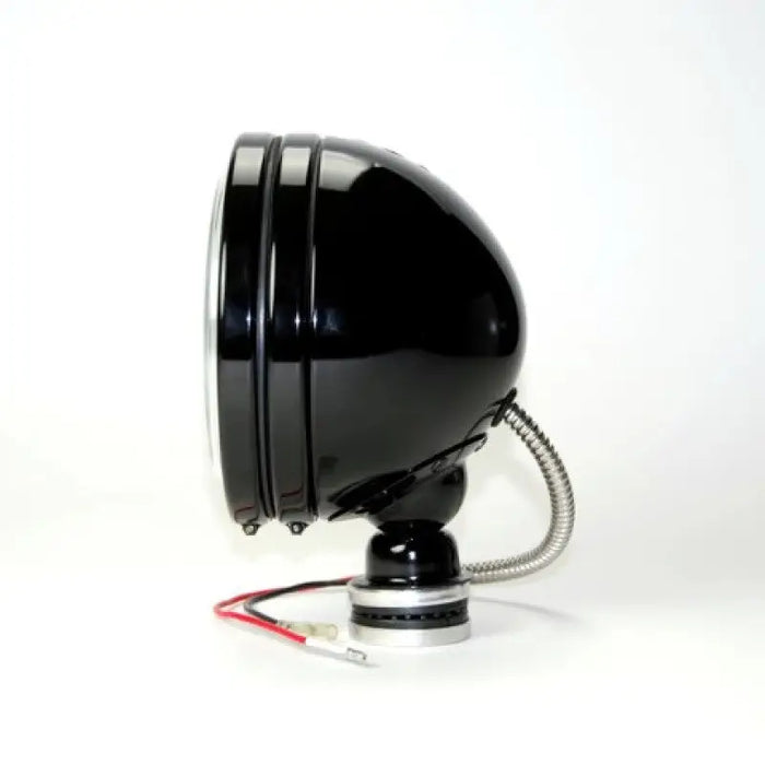 Black telephone on white background, KC HiLiTES Daylighter 6in. Halogen Light spot beam.