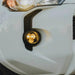 White car with yellow light - KC HiLiTES FLEX ERA 3 Dual Mode SAE Fog Lights